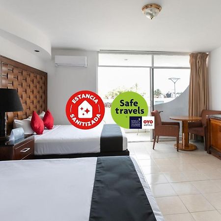 Capital O Zona Dorada Inn, Масатлан Экстерьер фото
