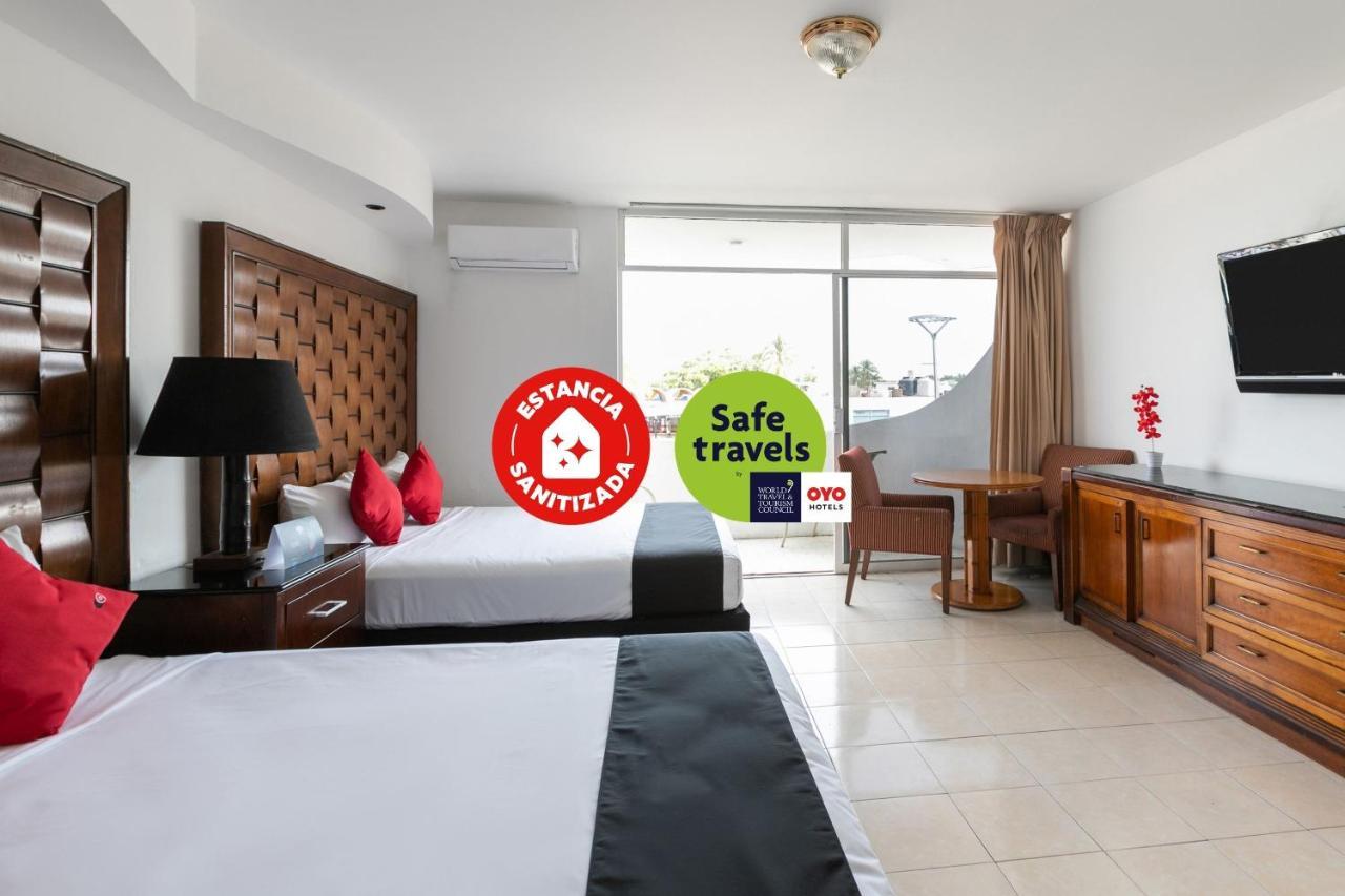 Capital O Zona Dorada Inn, Масатлан Экстерьер фото