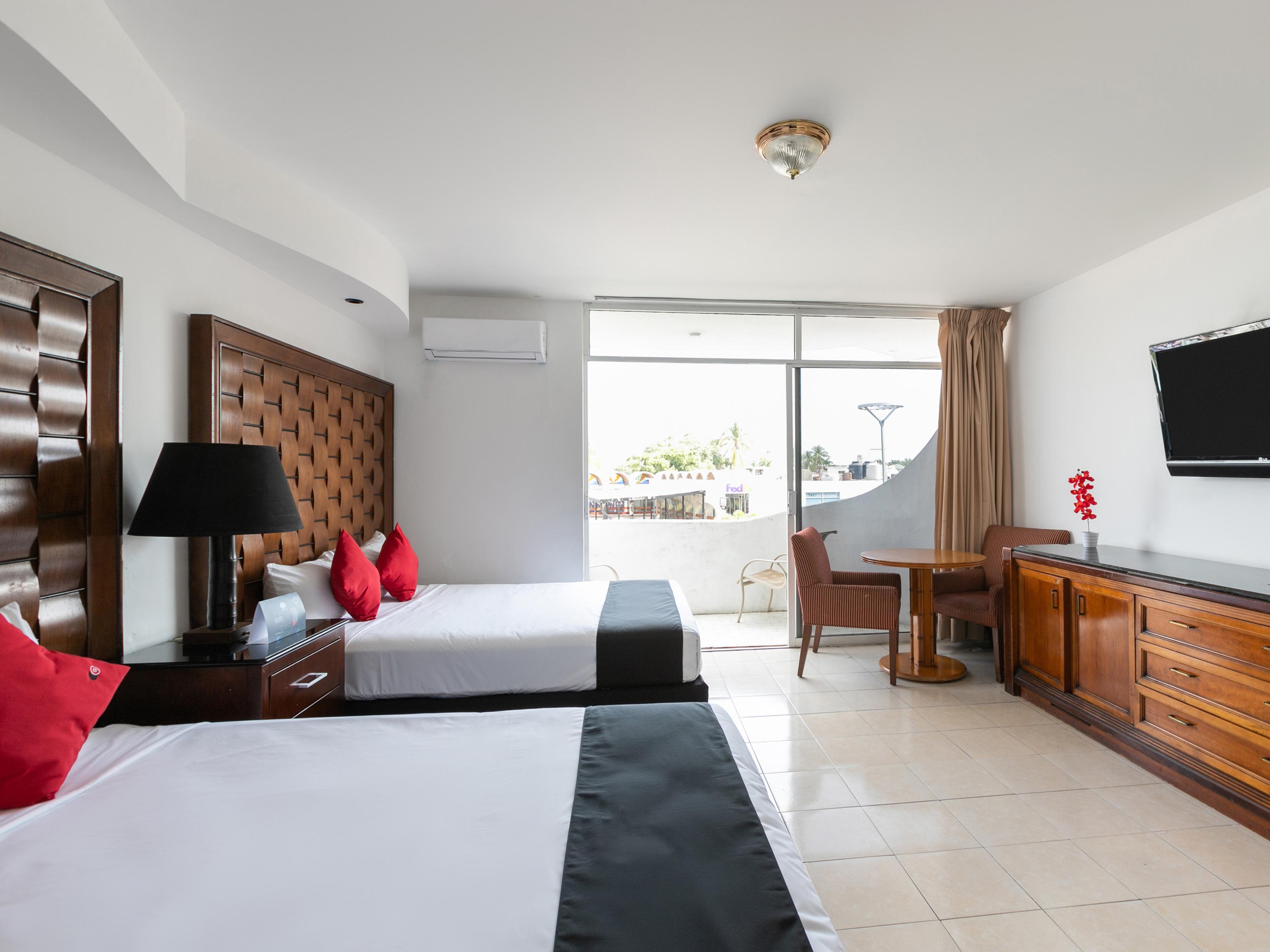 Capital O Zona Dorada Inn, Масатлан Экстерьер фото