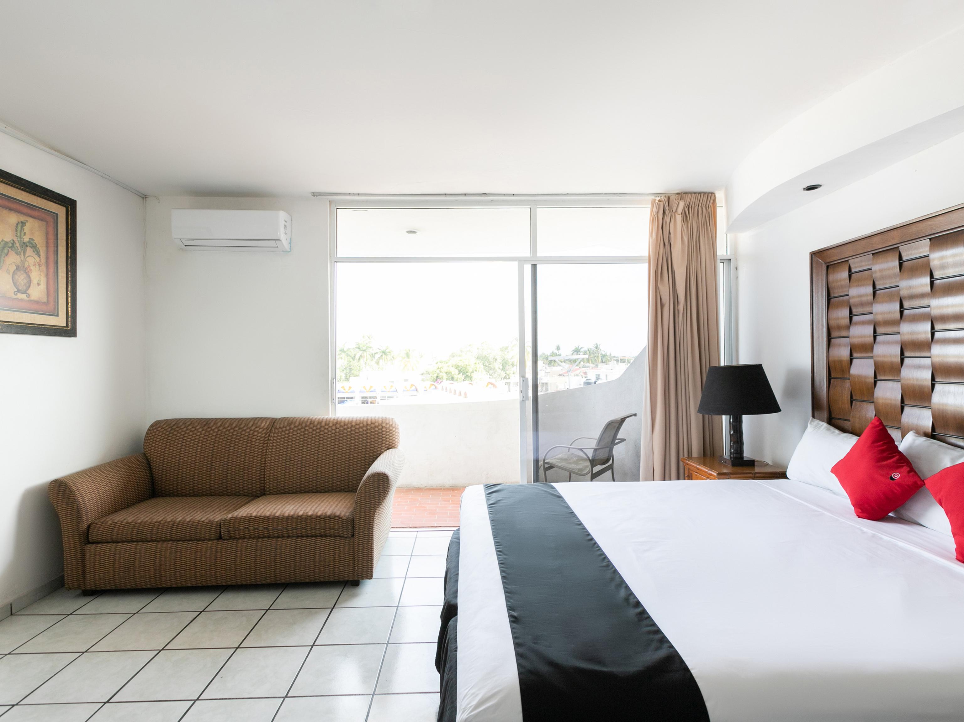 Capital O Zona Dorada Inn, Масатлан Экстерьер фото
