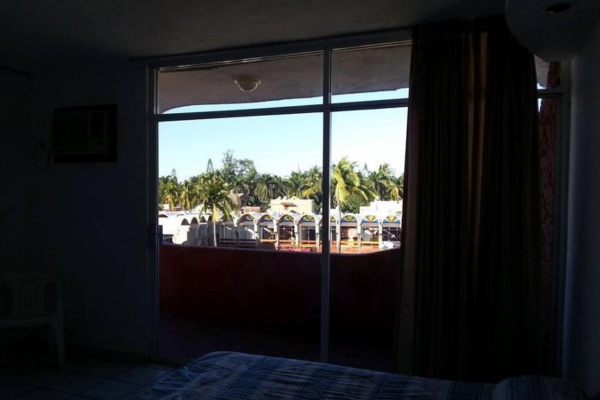 Capital O Zona Dorada Inn, Масатлан Экстерьер фото